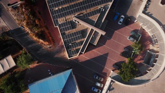 Rooftops with Solar Panels Aerial view Drone footage over Rooftops with Solar Panels