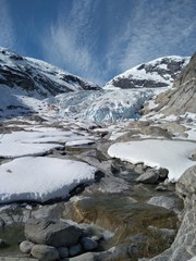 Fototapeta na wymiar The Nigardsbreen Glacier with snow in Norway in the spring 