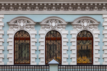 Fragment of the facade of an old building with a beautiful ornament