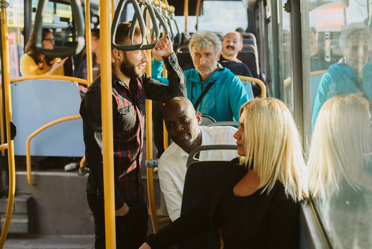 Passengers inside of public transport - Powered by Adobe
