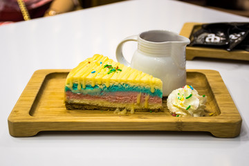 Triple flavour cheesecake with ice cream and flakes, special sauce topping