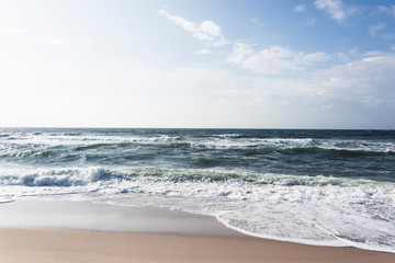 View of beach and clouds