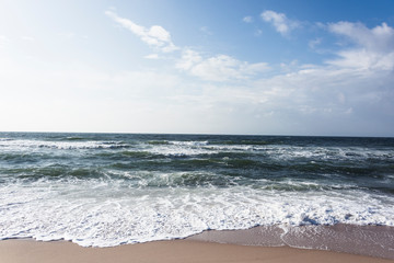 View of beach and clouds