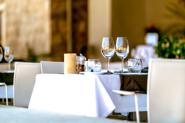 Glasses table setting in a summer restaurant