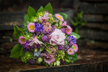 Colorful flower bouquet on stairs