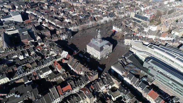 Aerial view of Maastricht town hall in the Netherlands it is sited on the Markt and the building was designed by Pieter Post in the 17th century in the style of Dutch classicism 4k high resolution