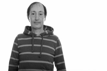 Studio shot of mature man looking at camera