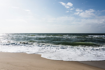 View of beach and clouds