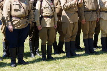 Uniforms and weapons of Russian soldiers during the first world war. Details of soldiers ' uniforms...