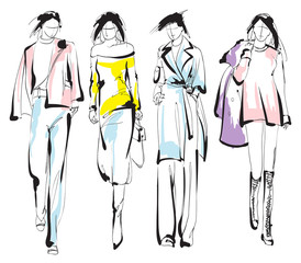Beautiful young womens. Hand drawn fashion girls. Fashion model posing. Sketch. Vector illustration set.