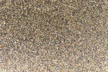 background of colored pebbles and sand