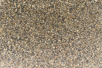 background of colored pebbles and sand