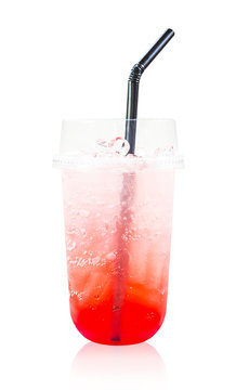 Strawberry italian soda drink in glass with straws.