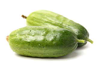 Green cucumber on the white background