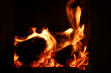 Fototapeta premium blurred burning coals in the stove