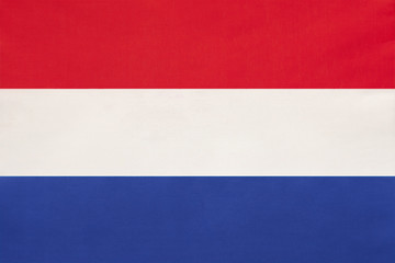 Netherlands national fabric flag textile background. Symbol of international world european country.
