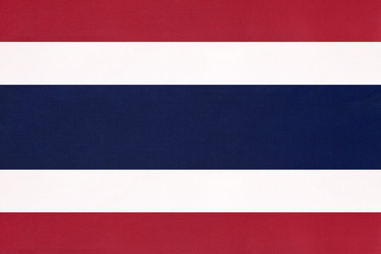 Thailand national fabric flag, textile background. Symbol of international asian world country.