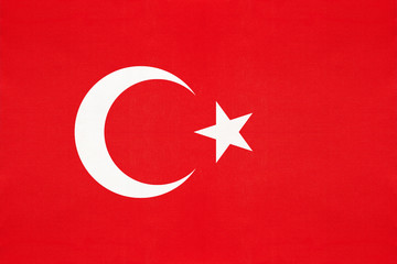 Turkey national fabric flag, textile background. Symbol of international asian world country.