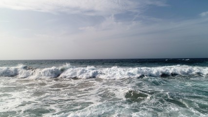 Fototapeta premium landscape and sunset on the Atlantic coast watching the breaking of the waves