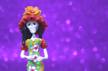 HALLOWEEN DOLL OVER PURPLE