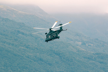 Fototapeta na wymiar Elicottero militare in volo - AW 149
