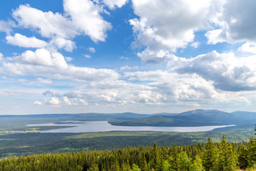 Fototapeta na wymiar Beautiful view from the Zyuratkul ridge on the lake Zyuratkul. Zyuratkul lake is a high-mountain lake in the southern Ural. Zyuratkul national Park, Chelyabinsk region, Russia.
