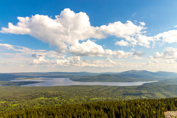 Obraz premium Beautiful view from the Zyuratkul ridge on the lake Zyuratkul. Zyuratkul lake is a high-mountain lake in the southern Ural. Zyuratkul national Park, Chelyabinsk region, Russia.