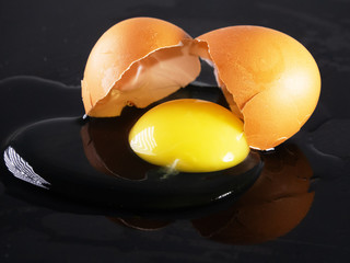 eggshell is broken and the contents of egg flowed out