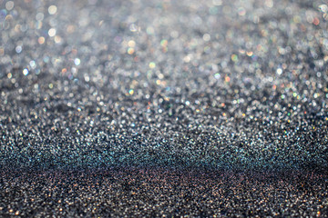 Water drops on hydrophobic fabric; abstract glittering background; selective focus; shallow depth of field