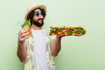 young crazy bearded man tourist with a big sandwich