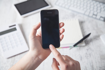 Business girl using smartphone. Technology