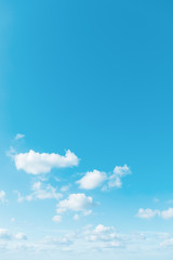 Blue sky background with cumulus clouds - 292936942