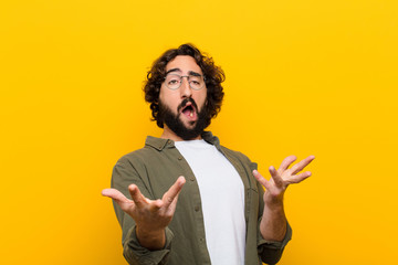 young crazy man performing opera or singing at a concert or show, feeling romantic, artistic and...