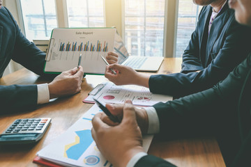 Business people meeting together to planning market and business investment.