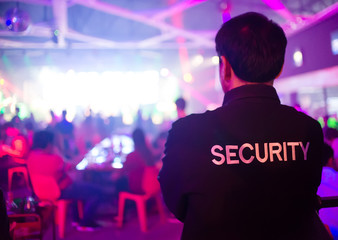 security guard in night club - obrazy, fototapety, plakaty