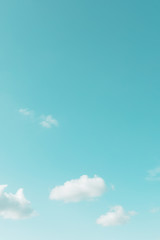 Blue sky background with cumulus clouds