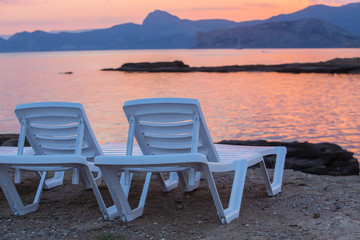 Sun loungers by the sea