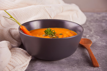 Healthy eating carrot cream soup. Vegetarian vegetables soup.