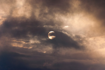 sun obscured by clouds