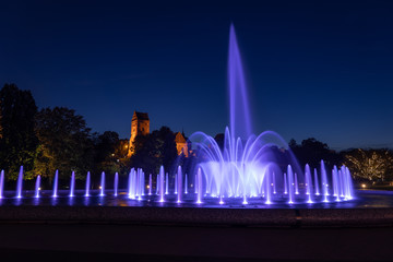 Park Fountain Illuminated at Night in Warsaw