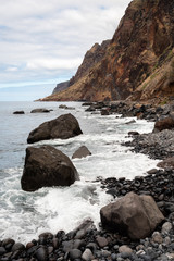 Fototapeta na wymiar Pebble beach of Madeira - Madeira, Portugal