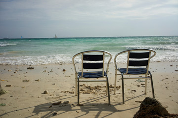 two chairs on the beach