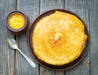 pancakes in a clay plate