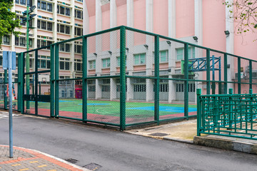 Fototapeta na wymiar Fenced Basketball Court
