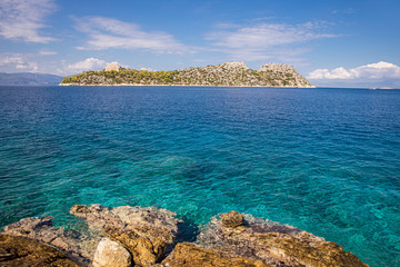 Summer sunny day beautiful view from the island of Agistri to the small island Dorousa, Aponissos...