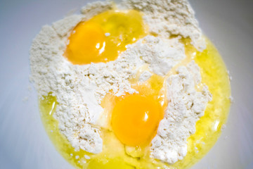 flour and egg in a bowl