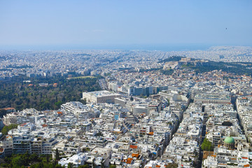 Athens in spring, view from hill,  cityscape with streets and buildings, ancient urbal culture