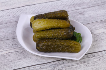 Pickled cucumbers heap in the bowl