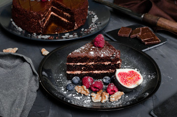 chocolate cake with fresh berries and nuts