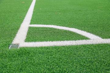 Obraz premium Bau von Sportanlagen: Spielfeld aus Kunstrasen 